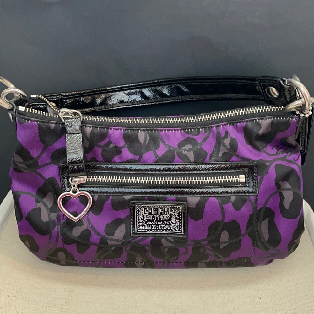 Coach daisy animal print ocelot